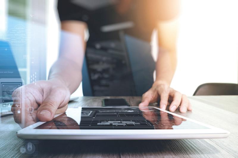 image of person using tablet